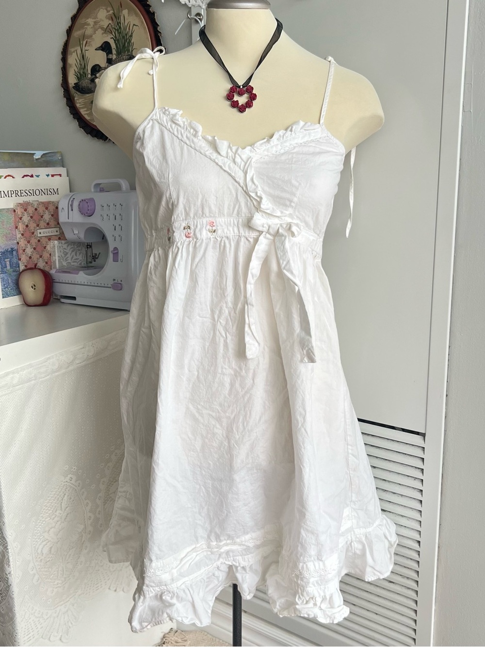White floral embroidered babydoll dress with ruffles